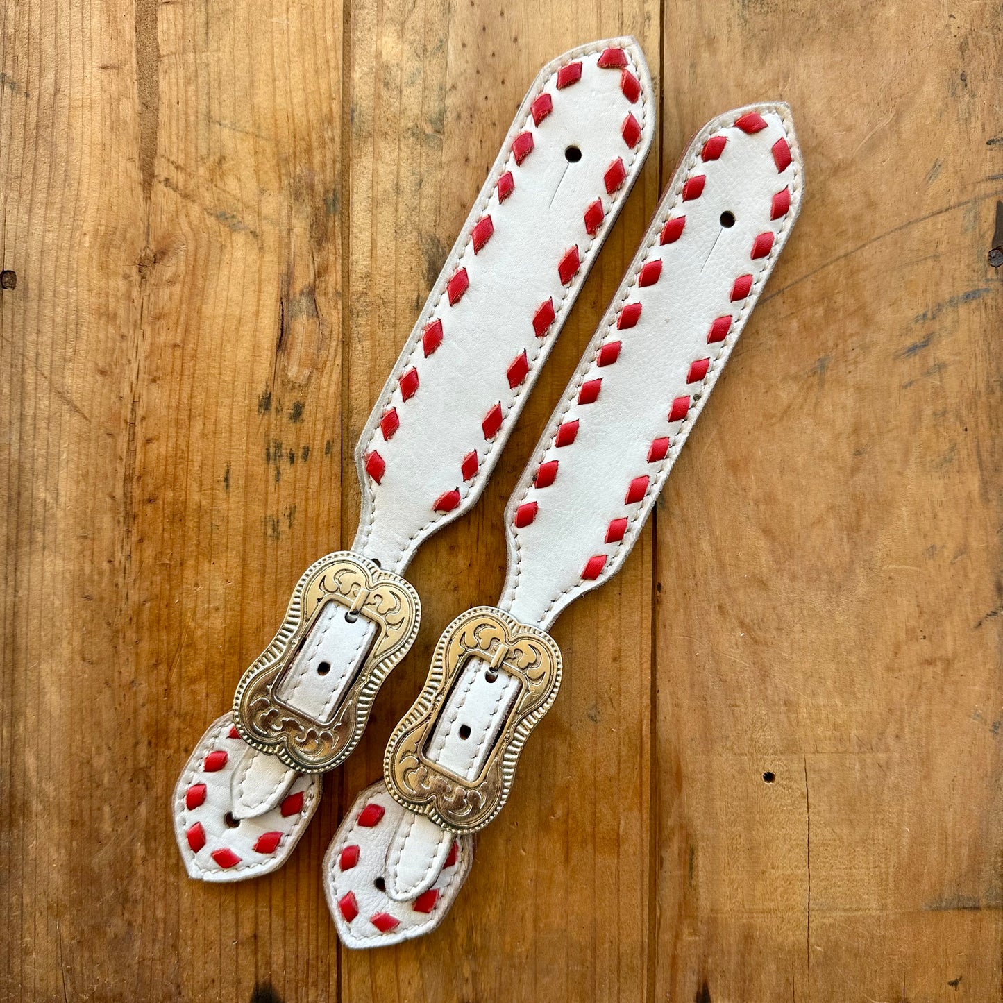 White Leather Spur Straps With Red Buckstitch