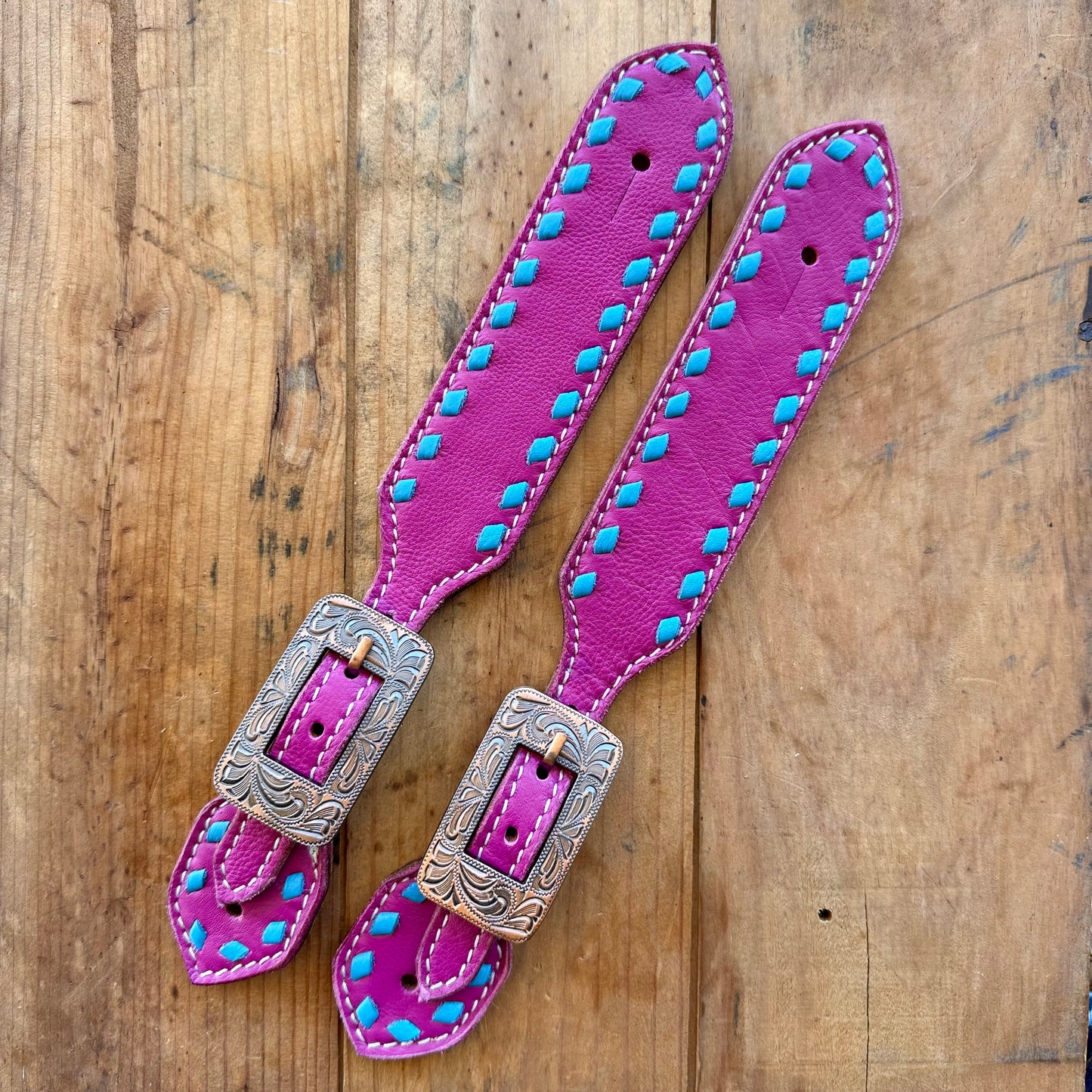 Pink Leather Spur Straps With Turquoise Buckstitch