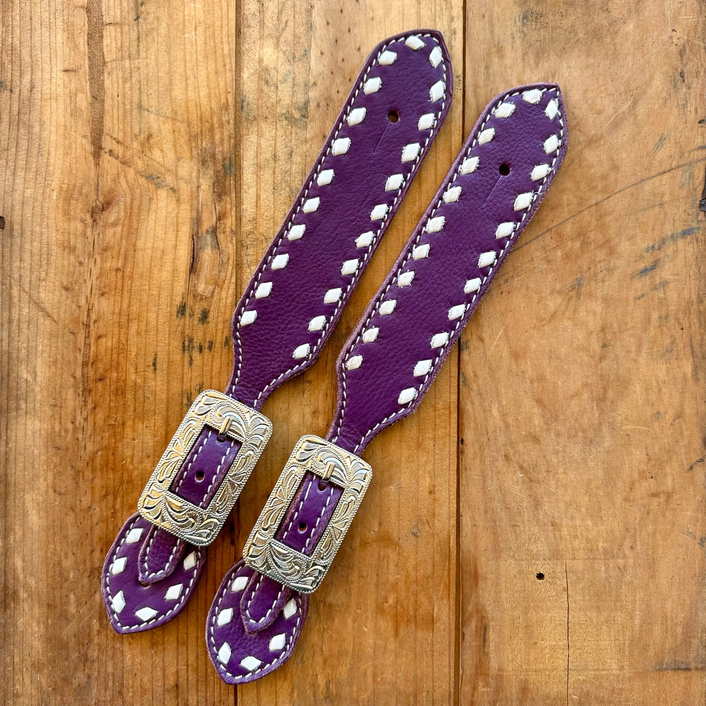 Purple Leather Spur Straps With White Buckstitch