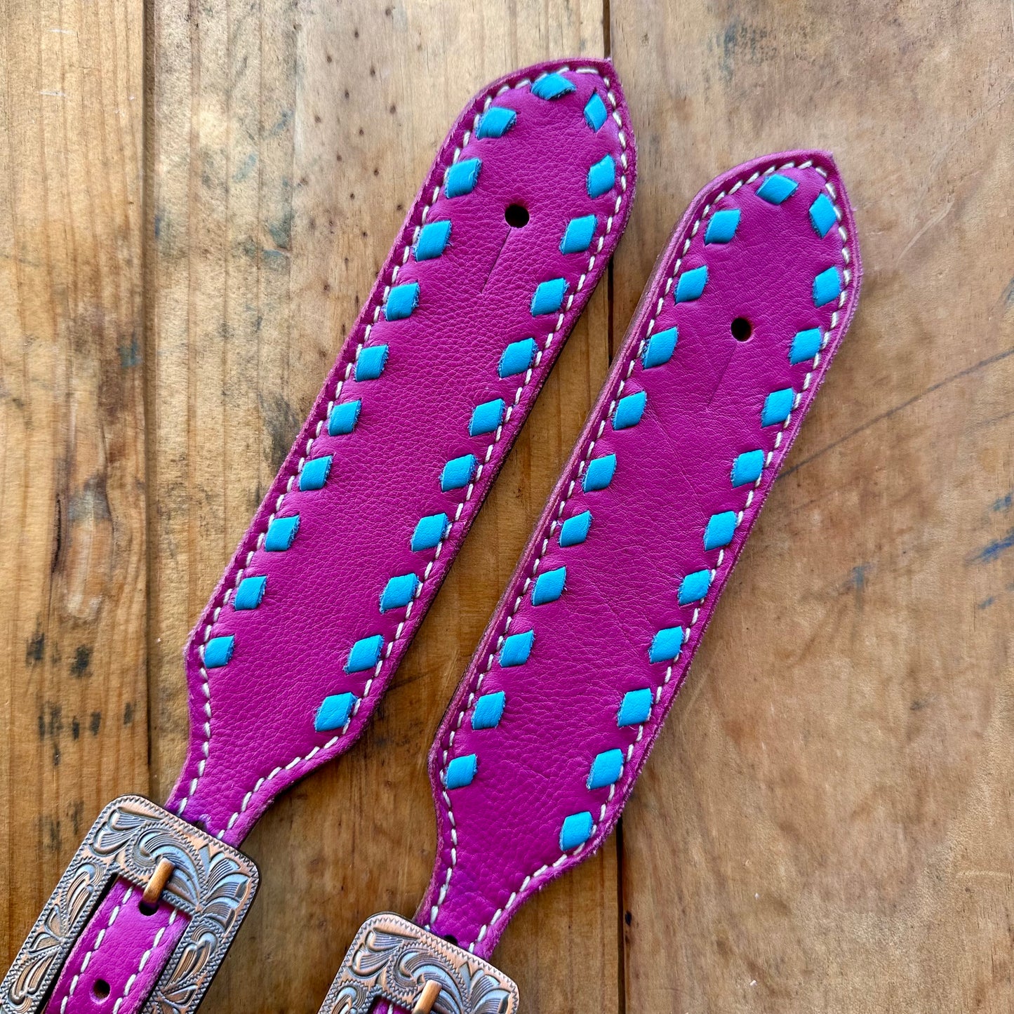 Pink Leather Spur Straps With Turquoise Buckstitch