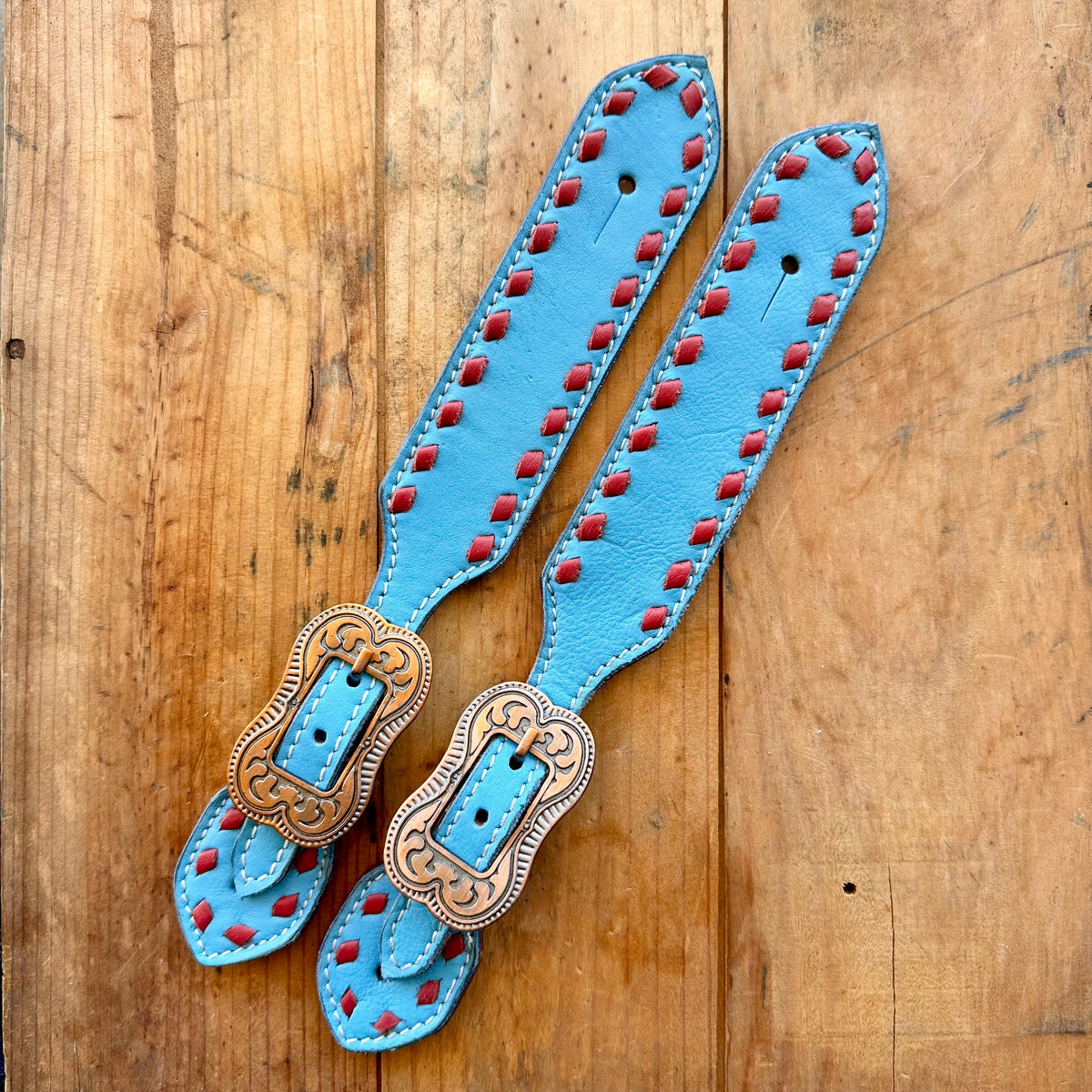Turquoise Leather Spur Straps With Red Buckstitch