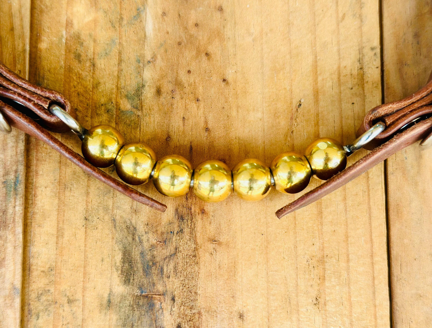 Dustybutts 7 Ball Brass Curb Strap